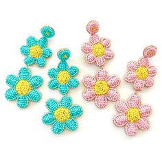 Beautiful hand beaded daisy flower statement earrings that are perfect for adding a unique touch and a burst of color to your spring and summer outfits. You will love the bold pastel colors and attention to detail. Great gift idea! ~ See all photos for length ~ Post back ~ Price is for 1 pair ~ Soft felt backing BEFORE YOU PURCHASE... Most Items are handmade so no two pieces are exact. Colors may vary and there can be imperfections. This is normal.  Not for children. Adult use only. Spring Beaded Flower Drop Earrings, Beaded Flower-shaped Earrings For Spring, Blue Flower Beaded Earrings For Summer, Spring Beaded Flower-shaped Earrings, Summer Blue Flower Beaded Earrings, Spring Flower-shaped Beaded Earrings, Spring Turquoise Flower Earrings, Beaded Flower Earrings For Summer, Turquoise Flower Earrings For Summer