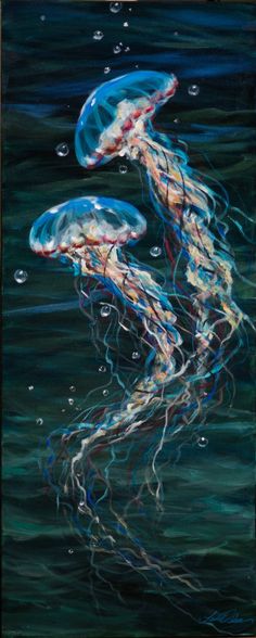 two jellyfish swimming in the water with bubbles