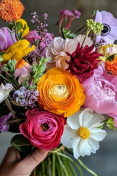 Bold and Beautiful—The Wildflower Bouquet That Makes a Statement September Wedding Bouquets Simple, Ranunculus Bouquet Wedding, February Bouquet, Peony Wedding Flowers, Bright Bridal Bouquet, Bright Floral Wedding, Wildflower Arrangements, Dahlia Wedding Bouquets, Ranunculus Wedding Bouquet