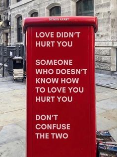 a red sign that reads love didn't hurt you someone who doesn't know how to love you, don't confus the two