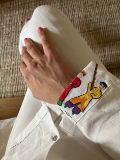 Hand embroidery on shirt upcycled colorful textile art Illustration Embroidery, Embroidered Linen Shirt, Diy Embroidery Shirt, Linen Style Fashion, Upcycled Textiles, Kids Frocks Design, Embroidery Tshirt, Hand Embroidery Patterns Flowers