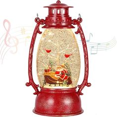 a snow globe with musical notes in the background and an image of santa claus on sleigh