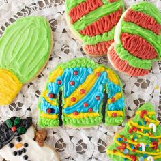 decorated cookies on a doily with frosting