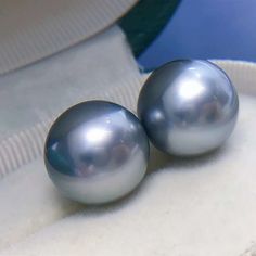 Stunning Huge Tahitian Pearl Earring Stud, 14.7mm, Bright Platinum Silvery Gray Color, Very High Luster.   Solid 18K White Gold, Very Well made and Comfortable to wear. Classic and Elegant.  Classic and Elegant   Lustrous Beauty   Rare Find  Pearls ★ Pearl: Genuine Tahitian pearl, Saltwater  ★ Size: 14.7mm ★ Shape: Near Round ★ Color: Natural untreated, Bright Platinum Silvery Gray Color, Stunning ★ Luster: Very High luster, Wonderful ★ Surface: Nice, Smooth and Mirror Like, Mostly clean, gentle Tahitian Pearl Round Anniversary Earrings, Grey Pearl Earrings, Tahitian Pearl Earrings, Earring Stud, Pearl Earring, Tahitian Pearls, Pearl Grey, Pearl Stud Earrings, Tahiti