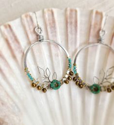 Handmade Silver Botanical Hoop Earrings With Green, Bronze and Turquoise Beads, Wire Leaf Detail - Etsy Wire Leaf, Turquoise Beads, Handmade Silver, Dangle Drop Earrings, Hoop Earrings, Turquoise, Drop Earrings, Beads, Green