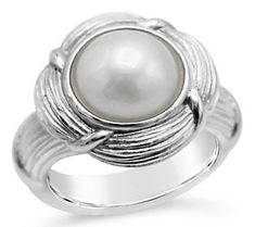 We think this gorgeous, creamy Mabe cultured pearl ring would make a mabe-lous addition to your jewelry wardrobe (wink, wink). From Ariva. Classic White Pearl Ring With Bezel Setting, White Pearl Ring With Bezel Setting In Classic Style, Classic Pearl Ring With Bezel Setting, Elegant White Pearl Ring With Bezel Setting, Unique Sterling Silver Pearl Ring For Formal Occasions, Adjustable Sterling Silver Pearl Ring, Luxury Sterling Silver Round Pearl Ring, Luxury Sterling Silver Pearl Ring With Polished Finish, Hallmarked Sterling Silver Pearl Ring