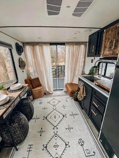 the kitchen is clean and ready to be used as a living room or dining area