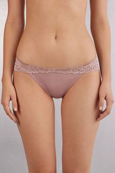 Low rise panties in lace with soft microfiber front. Based on the color chosen, the lace can be of contrast color or tone-on-tone. Inner gusset in 100% cotton.
The model is 5’ 9” (175 cm) tall and is wearing a size 2 / S. Leni Klum, Undershirt Tank Top, High Waisted Briefs, Cotton Bras, Corset Lingerie, Bra Types, Tank Top Camisole, Bra And Panty Sets, Swimwear Sale