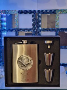 a stainless steel flask and shot glass in a gift box with the word bride juice on it