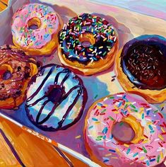 a painting of donuts in a box with sprinkles