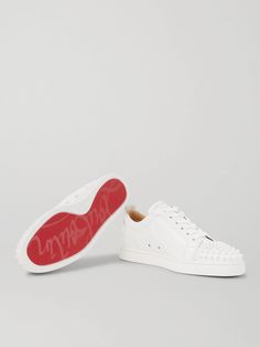 Christian Louboutin's 'Louis Junior' sneakers are a core style in its lineup, with different variations issued each season. This white leather pair is as classic as it gets, with tonal spiked toecaps delivering a bit of the brand's signature rock 'n' roll energy. Louboutin Sneakers Mens, White Louboutin, Louboutin Shoes Mens, Louboutin Collection, Christian Louboutin Men, Sneakers For Men, Stockholm Fashion, Lace Fashion, Louboutin Shoes