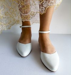 Ankle Strap Wedding Shoes For Bridesmaids, Low Heel Wedding Shoes With Heel Strap For Bridesmaids, Bridesmaid Wedding Shoes With Heel Strap And Low Heel, Fitted Low Heel Wedding Shoes For Ceremony, Elegant Flat Heel Wedding Shoes For Bride, Fitted Flat Heel Wedding Shoes, Wedding Court Shoes With Ankle Strap And 4-inch Heel, White Flat Heel Wedding Shoes For Bridesmaids, White Flat Heel Bridesmaid Wedding Shoes