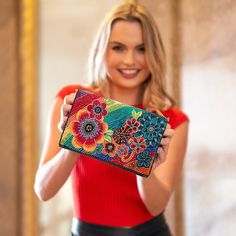 Embrace a wonderland of fun and style with this crossbody handbag. Featuring a playful rainbow of beaded & embroidered flowers on a soft leather body, this bag will add a pop of happiness to your wardrobe. Don't forget the matching Wonderland Wallet. 8.25 x 1.75 x 5.5" Strap Length End to End: 49" Strap Drop: 23.5" Removable crossbody chain strap with beaded leather shoulder piece Magnet closure Inside pocket Back pocket Contains leather Fits a phone Includes: metal logo fob, protective storage Multicolor Embroidery Crossbody Shoulder Bag, Colorful Shoulder Bag For Gift, Multicolor Clutch Shoulder Bag, Shoulder Piece, Big Handbags, Mary Frances, Best Handbags, Handmade Purses, Top Handle Handbags