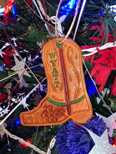 an ornament is hanging on a christmas tree