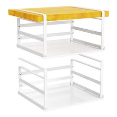 two white shelves with yellow top and bottom shelf