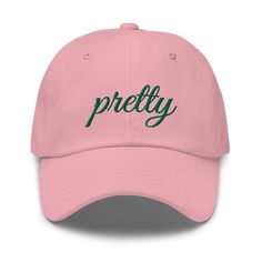 "This Pink and Green Sorority hat will quickly become your go-to accessory! It has a low profile with an adjustable strap and curved visor. *Pretty is beautifully embroidered in green on the center of the cap. **Customization available on back, left or right side of hat! ABOUT * 100% chino cotton twill * Unstructured, 6-panel, low-profile * 6 embroidered eyelets * 3 ⅛\" (7.6 cm) crown * Adjustable strap with antique buckle *Colors may display differently on your monitor than what is actually printed. Small variations in color can and will occur. Visit my shop for more https://www.etsy.com/shop/525designshop *This product is made especially for you as soon as you place an order, which is why it takes us a bit longer to deliver it to you. Making products on demand instead of in bulk helps re Fearless Women, Embroidered Baseball Caps, Embroidered Caps, Green Hats, Camo Colors, Negroni, Dad Caps, Wave Design, Green Camo