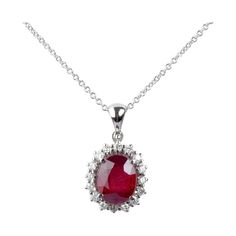 18 carat white gold necklace designed with 1 oval ruby weighing 3.31 carat and 16 round brillant cut diamonds weighing 0.40 carat in total. Qualité du diamant Couleur : F - G Clarté : VS - SI Weight: 5.54 gr. Dimensions : 45 x 0.10 cm Dimensions of the pendant : 2.10 x 1.20 x 0.80 cm Jewel delivered with a luxurious box and its International AIG certificate. Condition : Like new 18 carat gold eagle head hallmark on the jewel. Secure and express delivery within 24 to 48 hours. Formal Ruby Necklace With Halo Setting, White Gold Ruby Necklace With Brilliant Cut, White Gold Ruby Necklaces With Brilliant Cut, Oval Ruby Necklace With Brilliant Cut, White Gold Oval Ruby Necklaces, Oval Ruby Necklaces In White Gold, Ruby Diamond Necklace, Ruby And Diamond Necklace, Diamonds Necklace