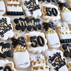 decorated cookies with black and white designs on them that say 50 years, made in the usa