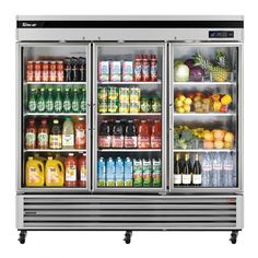 an open refrigerator filled with drinks and juices