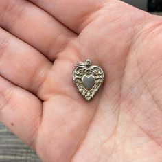 Vintage 925 Sterling Silver "Mother" Flower Repousse Puffy Heart Bracelet Charm I personally removed this charm from a bracelet so the jump ring has been carefully opened and closed. Please review the photos carefully as they are part of the description. Do not hesitate to reach out with any questions. I offer combined shipping so be sure to check out my other listings. Sterling Silver Dainty Charms For Anniversary, Dainty Sterling Silver Charms For Anniversary, Vintage Nickel-free Heart Bracelet As Gift, Nickel-free Vintage Heart Bracelet As Gift, Vintage Nickel-free Heart Bracelet Gift, White Gold Heart Charm Jewelry For Memorial, Engraved Heart Bracelet In Sterling Silver, Engraved Sterling Silver Heart Bracelet In White Gold, Engraved Heart Bracelet In White Gold Sterling Silver