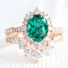 Oval Emerald Ring Stack Rose Gold Halo Diamond Ring U Wedding Band | La More Design Rose Gold Halo Diamond Ring, Rose Gold Emerald Ring, Emerald Engagement Ring Set, Diamond Alternative Engagement Ring, Rose Gold Tiara, Black Diamond Studs, Halo Diamond Earrings, May Birthstone Rings, Green Gemstone Ring