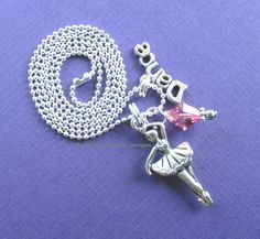 "This adorable necklace is the perfect necklace for your tiny dancer & great gift for dance recitals! A quote from Bella of Valebella who is my tiny dancer, \"forget the flowers, I'd rather get a present\".  This super sparkly necklace is made with the finest supplies including: silver  ballerina charm, swarovski crystal, silver dance charm, silver findings, 18 inch silver plated ballchain necklace. *Caution Choking Hazard* Earrings sold separately, order here: https://www.etsy.com/listing/21928 Ballet Necklace, Dance Recital Gift, Ballerina Necklace, Dance Recital Gifts, Prima Ballerina, Sparkly Necklace, Dance Necklace, Ballerina Dancing, Dance Gifts