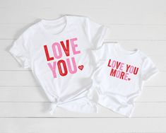 two t - shirts with the words love you and love you more printed on them