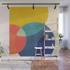 an abstract wall mural in a living room