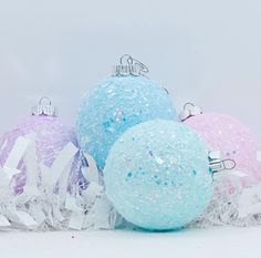 "Pastel Extra Large 4 Inch Sugar Glitter Ornaments  I painted these large shatter proof ornaments added glitter including iridescent which give them a great sparkle.  These have been sealed but they will shed glitter, hopefully most of it will be done during shipping.  Measure 4 1/2 top to bottom and 4\" across. GumDropSugarShop original  Spend 35$ in my shop get free shipping!! Follow me on Instagram for restock and newly listed items. @gumdropsugarshop" Pastel Christmas Ornaments Diy, Hobby Lobby Pastel Christmas Decor, Pastel Candy Christmas, Pastel Candy Christmas Tree Topper, Pastel Candy Tree Ornaments, Future Decor, Sugar Glitter, Candyland Christmas, Pastel Christmas