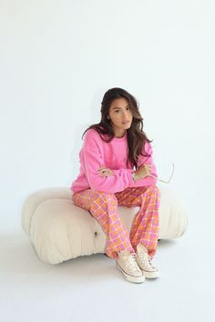 Stay fashionable and cozy with the Malibu Athletics Pullover in Pink. Made from high-quality cotton, this crewneck sweatshirt is perfect for those chill and relaxed days. The soft pink color and comfortable design make it a must-have for effortless everyday wear. Experience unmatched comfort and style with this statement piece.