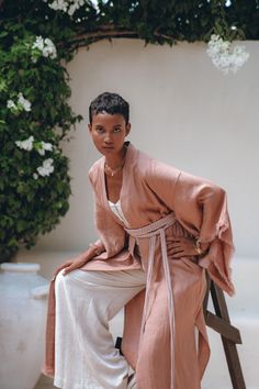 Our newest Dusty Pink Linen Kimono, has become already a bestseller in our show room and now available for you. This stunning outfit features a linen kimono and a belt that can be worn alone or as an extra layer with most of our dresses. With the help of the belt you can turn this kimono cardigan into a kimono dress. Crafted in Bali, this elegant kimono is completely made of organic linen that has anti-microbial and hypoallergenic properties, making it perfect for the body, adding grace and styl Cardigan With Belt, Boho Womens Clothing, Elegant Kimono, Kimono Boho, Linen Kimono, Bohemian Kimono, Linen Cardigan, Organic Cotton Dress, Boho Bridesmaid