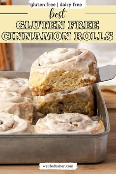 A single gluten free dairy free cinnamon roll being removed from a metal baking pan. Gluten Free Dairy Free Cinnamon Rolls Recipe, Gluten Free Cinnabon Copycat, Quick Gluten Free Cinnamon Rolls, Gluten Dairy Free Cinnamon Rolls, Easy Gf Cinnamon Rolls, Homemade Gluten Free Cinnamon Rolls, Gluten And Dairy Free Cinnamon Rolls, Gluten Free Fluffy Bread, Gluten Free Cinnamon Recipes