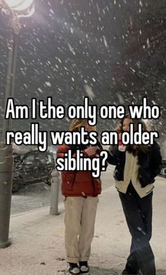 two people standing next to each other in the snow with text that reads am i the only one who really wants an older sibling?