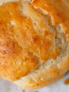 a close up of some bread on a piece of paper