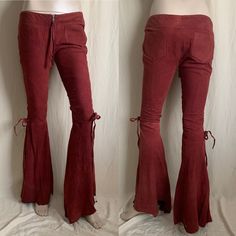 One Teaspoon Rust Suede Rocker Hippy Bell Bottoms Higher End Style From This Brand Real And Soft Suede Very Slim Through The Thighs Awesome Mermaid Flare With Ties At The Side Knees Low Rise No Size / Material Label Looks To Be Best For An Xxs To Xs Modeled On A Size Small Tall Mannequin Hems Are Damaged. I’ve Reformed Them Slightly And They Have A Cool Jagged Curved Look To Them. There Are A Few Small Holes But It Doesn’t Affect The Look At All. If It’s Bothersome It’s Pretty Easy To Patch Them One Teaspoon, Soft Suede, Bell Bottoms, Rocker, Low Rise, Pant Jumpsuit, Rust, Mermaid, Pants For Women