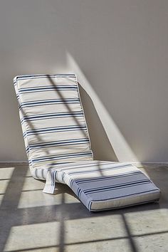 a chair that is sitting in the sun