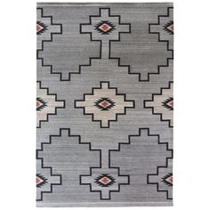 a gray rug with an orange and black design on the bottom, in front of a white background