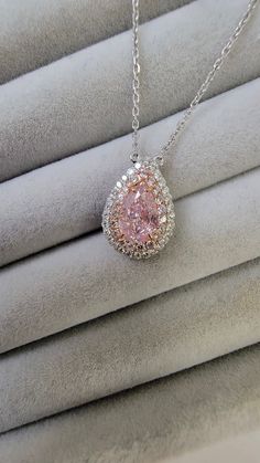 0.53 Carat GIA Light Pinkish Brown Pear VVS2 Clarity 0.30 Carats of Surrounding Diamonds 18 inch chain Handmade in 18k GIA Certified Diamond Pink Jewel Necklace, Luxury Silver Necklace Gia Certified, Luxury Gia Certified White Gold Diamond Necklace, Luxury Gia Certified Diamond Necklace Gift, Luxury Gia Certified Diamond Necklace As Gift, Pink Brilliant Cut Platinum Jewelry, Pink Platinum Jewelry With Brilliant Cut, Luxury Platinum Pear-shaped Necklace, Exquisite Gia Certified Diamond Necklace