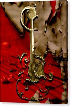 a golden key on a red background canvas print featuring an image of a gold key