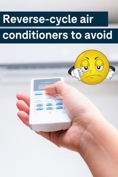 a hand holding a calculator with the words reverse cycle air conditions to avoid