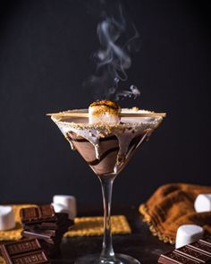 a chocolate martini garnished with marshmallows