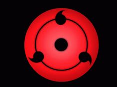 a red circular object with black circles around it