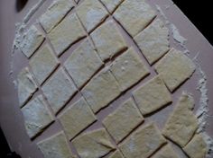 the dough has been cut into squares and is ready to be baked