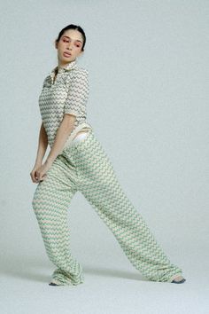 A pair of classic straight loose cut long pants, made from beige, slightly see-through stretchy cotton knit with green waves. Classic cut with an edge, finished with beautiful detailing, side pockets and a wooden effect button. Hugs the booty in all... Green Wave, Cotton Knit