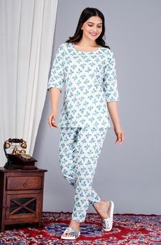 Name: "Women's White Cotton Printed Night Suit Top and Pyjama Co-ord Sets" Sizes: M (Top Bust Size: 38 in, Top Length Size: 29 in, Bottom Waist Size: 27 in, Bottom Length Size: 39 in)  L (Top Bust Size: 40 in, Top Length Size: 29 in, Bottom Waist Size: 28 in, Bottom Length Size: 39 in)  XL (Top Bust Size: 42 in, Top Length Size: 29 in, Bottom Waist Size: 29 in, Bottom Length Size: 39 in)  XXL (Top Bust Size: 44 in, Top Length Size: 29 in, Bottom Waist Size: 30 in, Bottom Length Size: 39 in)  Fre White Printed Loungewear Sets, White Printed Sets For Daywear, Cotton Matching Sets For Bedtime, Blue Printed Loungewear Sets, Cotton Bedtime Matching Sets, Cotton Bedtime Sets, Cotton Pant Set For Loungewear, Cotton Matching Palazzo Set, Blue Sleepwear Set