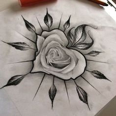 a pencil drawing of a rose with leaves on the side and sunburst in the middle