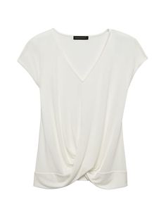 product photo White V-neck Rayon Top, Chic White V-neck T-shirt, Chic Surplice Neckline Top For Layering, Summer V-neck Twist Front Tops, Chic Relaxed Fit Tops Made Of Modal, Casual Drapey Tops For Layering, Chic Relaxed Fit Modal Tops, Casual Soft Stretch Top For Work, Elegant V-neck T-shirt For Summer