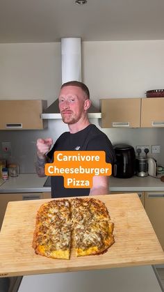 a man holding up a large pizza with the words carnivor cheeseburger pizza on it