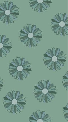 a green and blue flower wallpaper with small white dots on it's petals