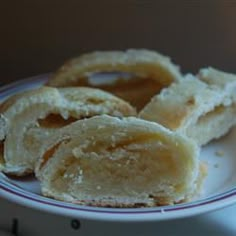 several pieces of doughnuts on a plate